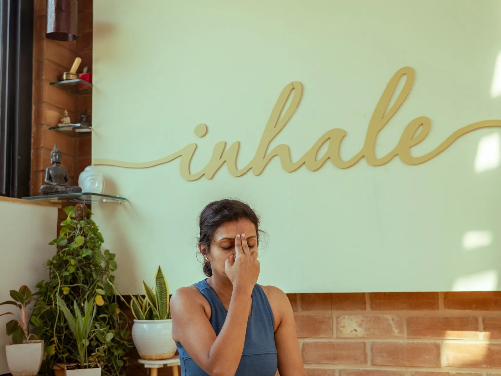 Student practising pranayama breathing at Absolute Yoga studio Kalyan Nagar Bangalore